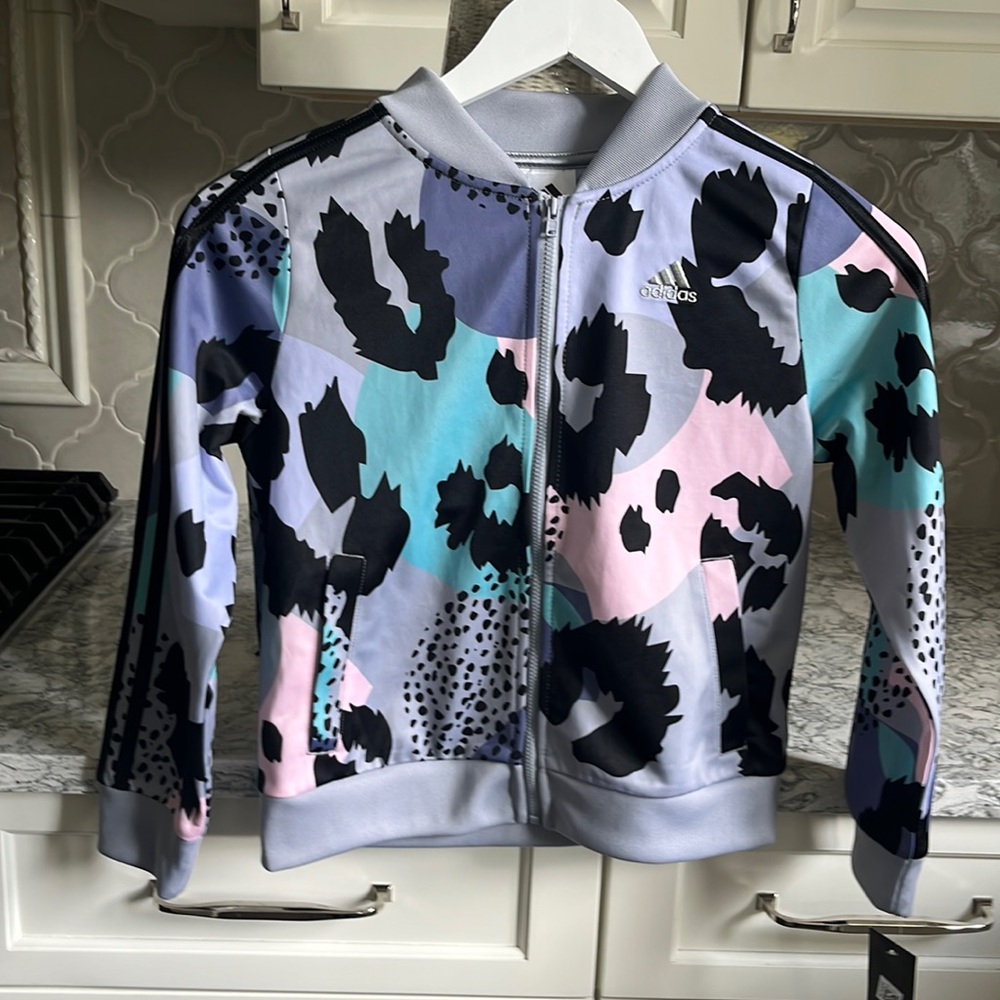 Super cute adidas jacket with a super cute and unique print on it